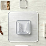Transparent adhesive wall hook